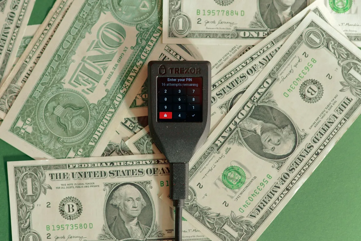 Money and currency on a table, representing the cost comparisons and payment method economics of gold purchasing